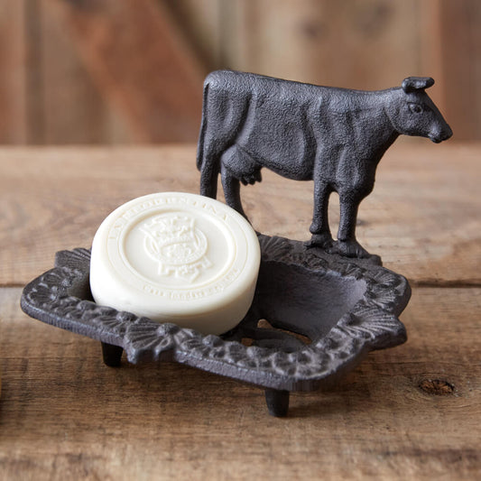 Wash up from a long day on the farm. Display our Cow Soap Dish in your bathroom or kitchen to accent any country home. A cow adorns the top with delicate details on the dish. Item is made of cast iron and features drain holes for ease of cleaning. Measurement: 6¾''W x 5½''D x 5''H