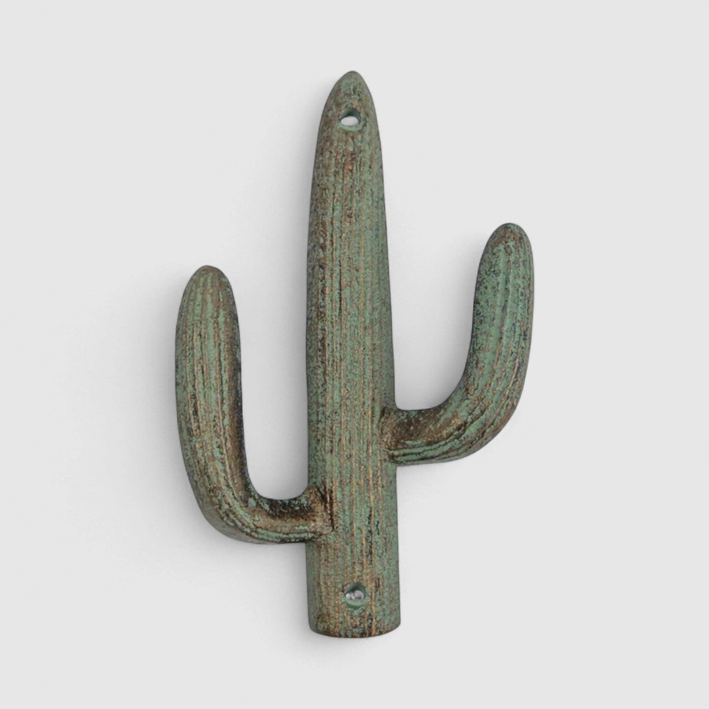 Cactus-shaped wall hook on a light gray background