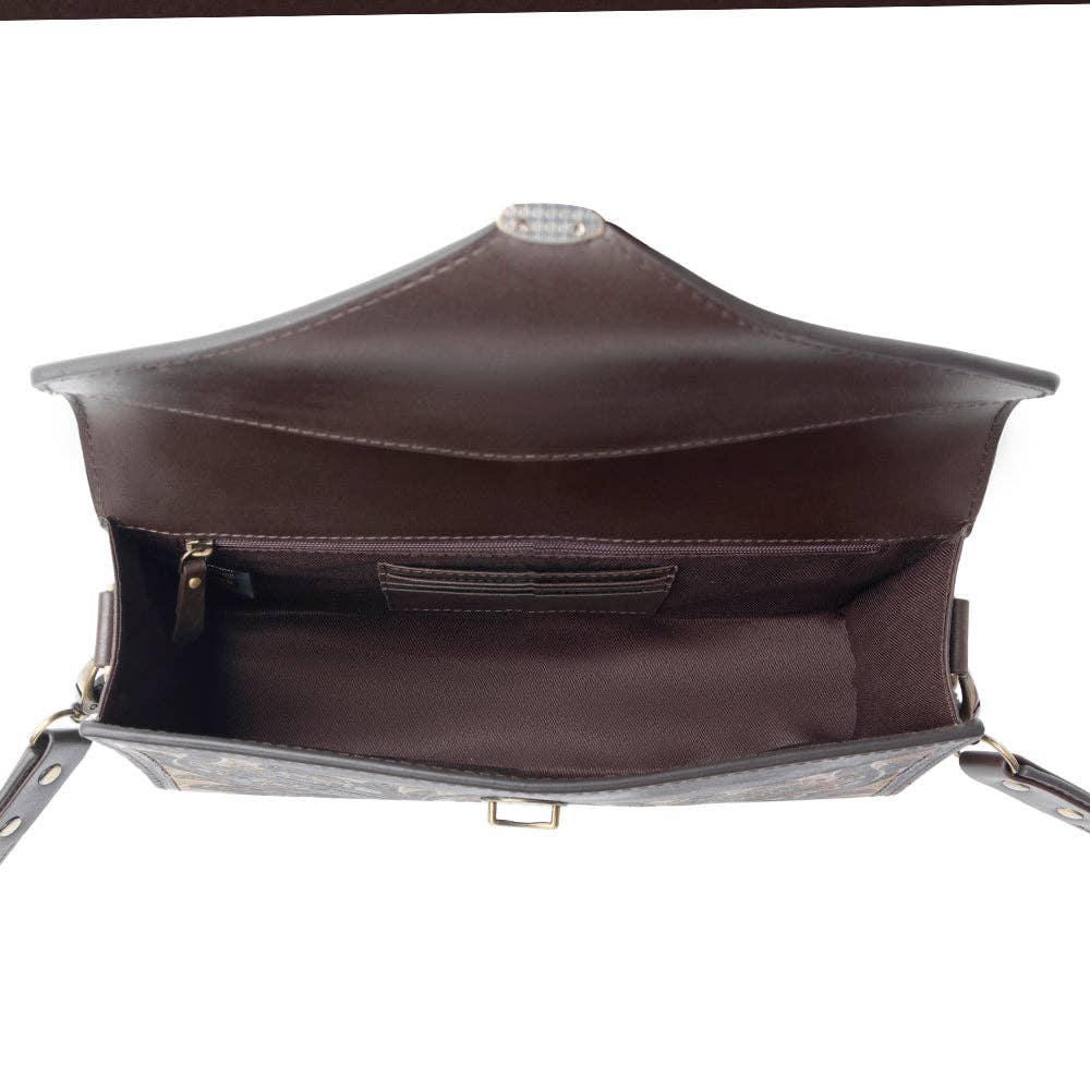 Brown leather handbag with a white background