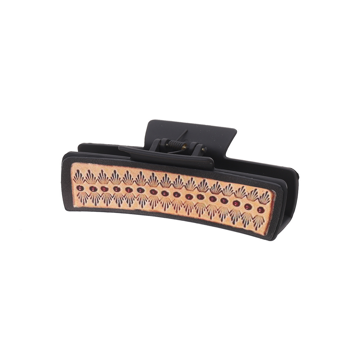 Decorative hair clip with intricate design on a white background