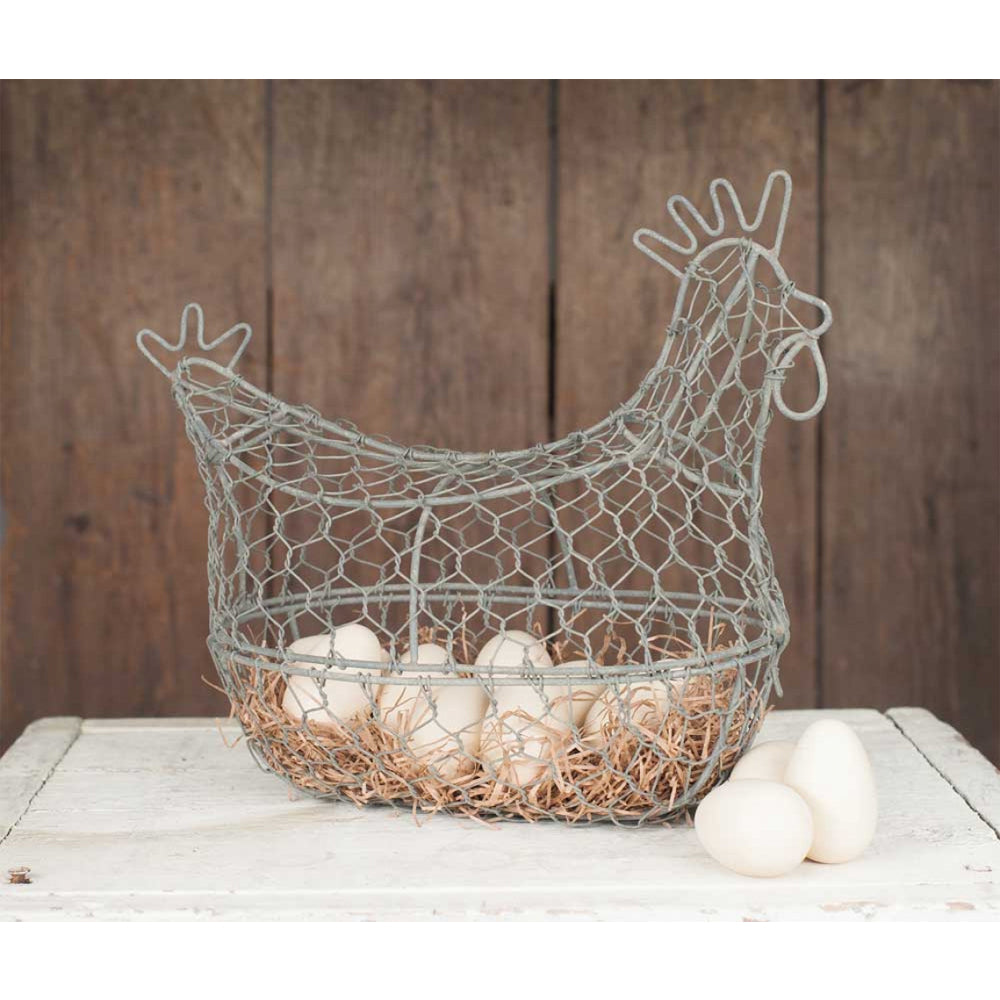 This chicken wire basket shaped just like the chick itself is a cute decoration for any home, cabin, farm, or kitchen. Fill it with decorations for the season for a fun look to switch it up. 13"L x 7"W x 11"T. Opens from the front with a clip. Eggs are not included.