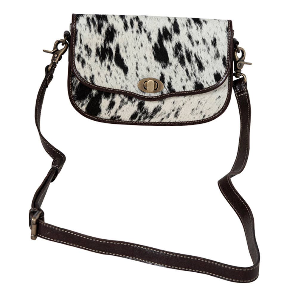 Angus Ridge Leather & Hair-on Bag Hide Purse featuring hair-on hide and adjustable leather shoulder strap.