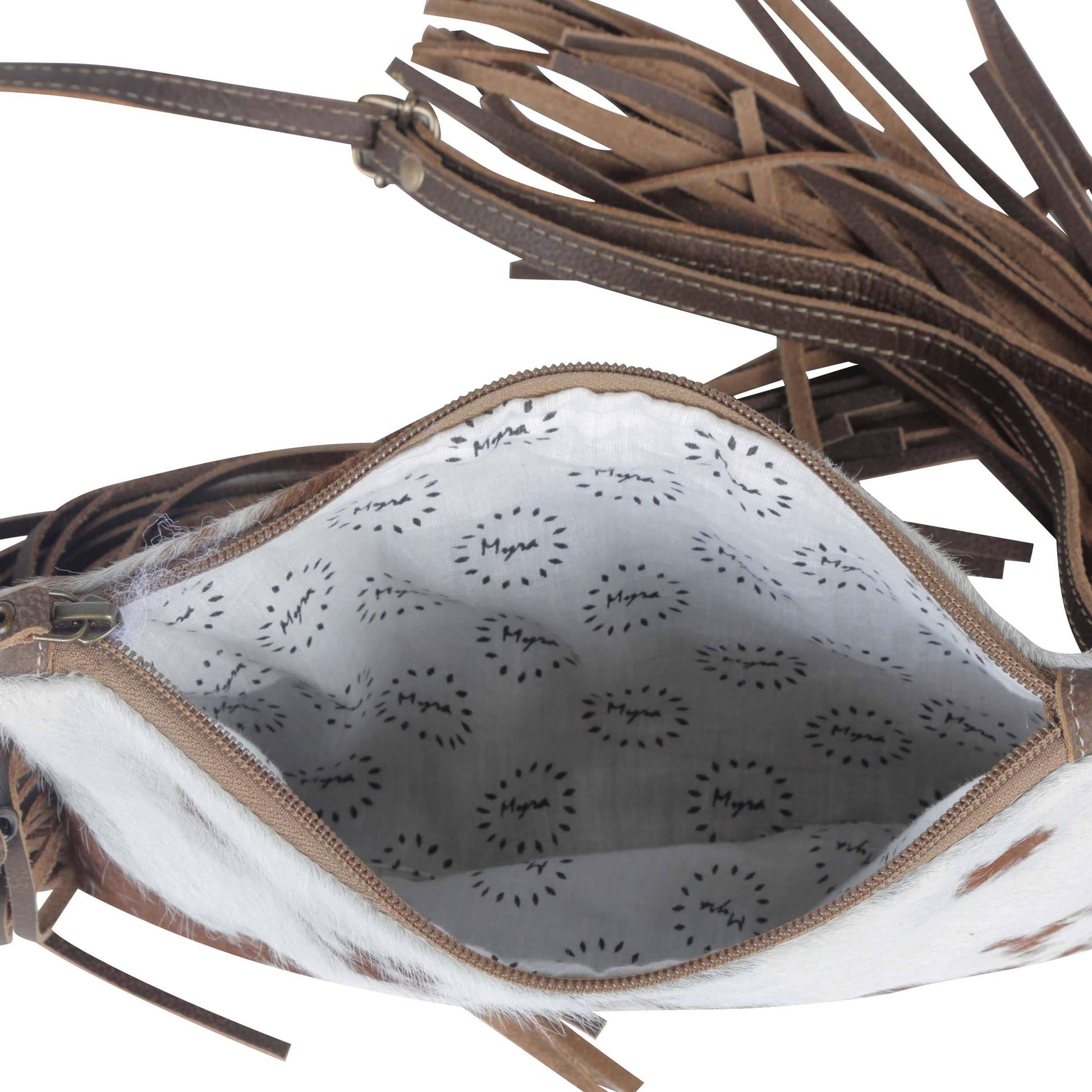 Open handbag with patterned interior on a white background