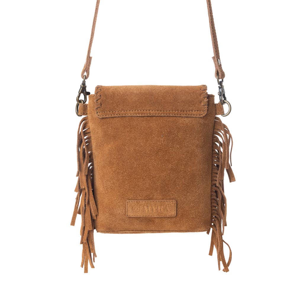 Brown suede handbag with fringe details on a white background
