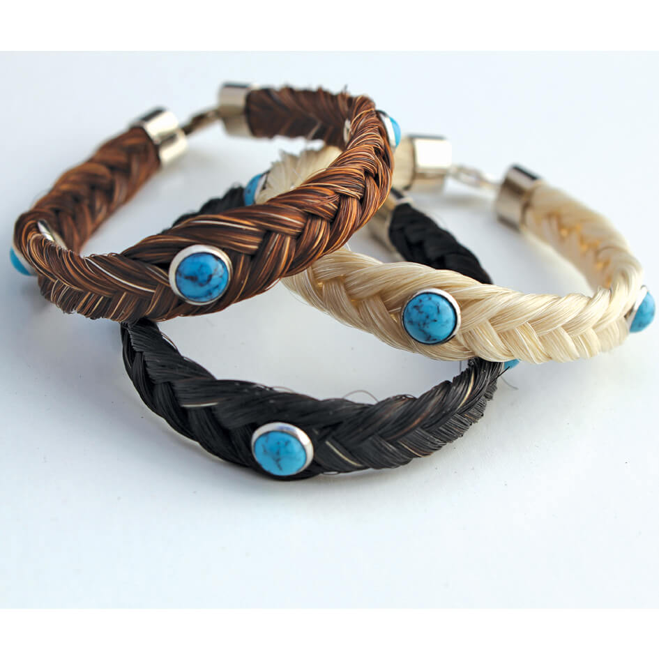 Treat yourself to a handmade horsehair bracelet. It also makes a great gift for that special someone. Enjoy the velvet softness of five-strand bracelets adorned with turquoise gemstones. The bracelet’s charm and lobster class are sterling silver.