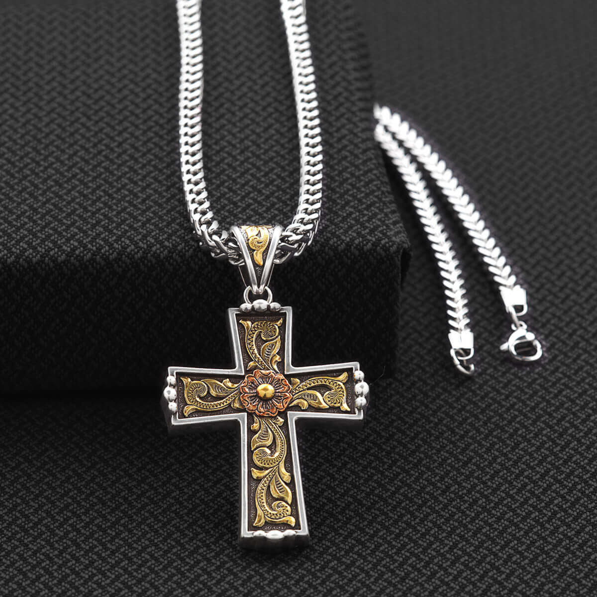 The striking antique silver and gold cowboy cross, accentuated with a touch of antique copper, is not just an accessory but a statement of grace and conviction. Suspended on a durable 24-inch stainless steel chain, this necklace promises both enduring beauty and resilience. Whether you're dressing up for a special occasion or looking to add a touch of class to your everyday ensemble, this necklace will undoubtedly become a cherished favorite in your collection.