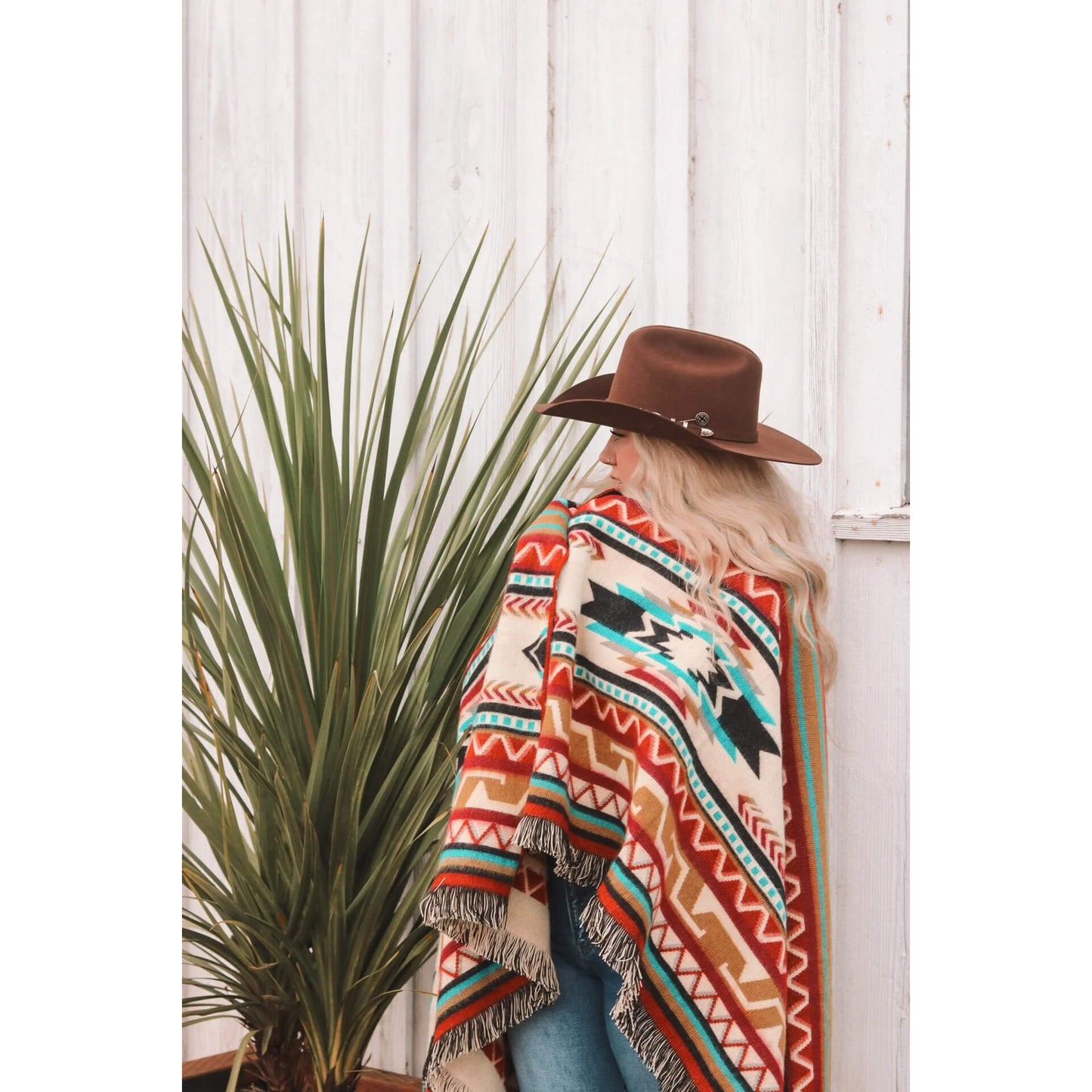 Cozy up your home decor. This southwest-inspired throw is super soft and features a colorful design that will brighten up any room. It’s also machine washable, so you can keep it looking like new for years to come.