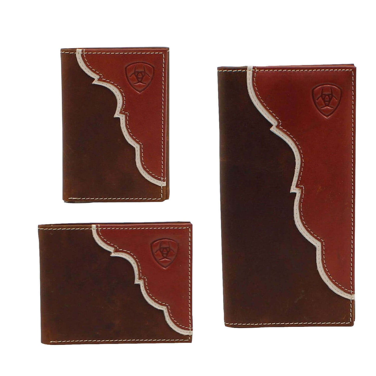 Stay organized in style with this rodeo style cowboy western wallet. Genuine two-tone leather with white underlay and features an embossed Ariat shield logo the upper right corner. Crafted with top grain leather and features multiple compartments for your credit cards, cash and ID.