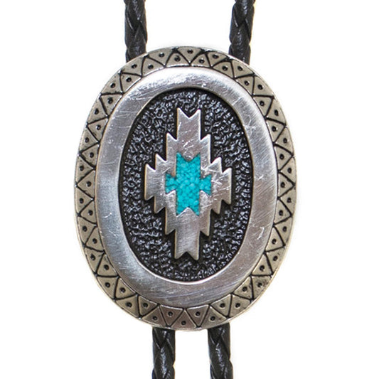 An Aztec Geometric design is featured on this beautiful Bolo Tie made of lead-free pewter with a turquoise chip inlay. Bolo tie cords are 38" long and feature finely detailed Victorian style bolo tips with a hand-carved look. Made in the USA.