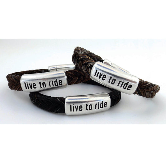 Living to Ride is what we are all about. It's how we spend our leisure time. It's what we live for! What's your ride? These handsome horsehair bracelets are accented with “live to ride” on metal slide. Each is finished with a magnetic clasp for easy attachment and is available in three sizes. A statement piece for both men & women. 