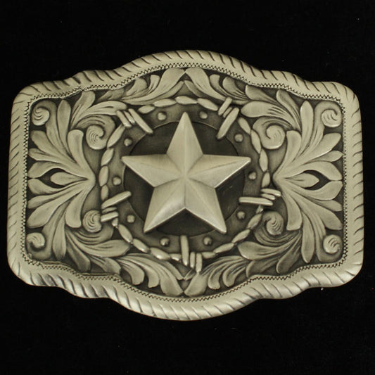 This rectangle Nocona men's western buckle is antique silver with a western scroll background. Single star with barbwire border in center of the buckle. It measures 3 x 3-1/2. Imported