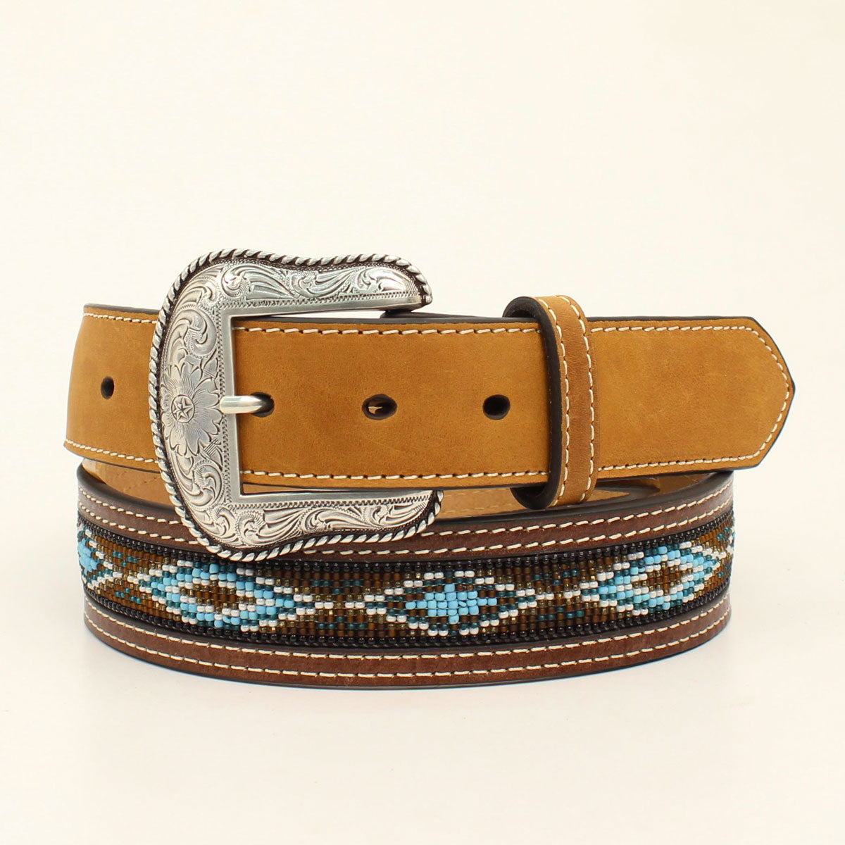 Pairs perfectly with jeans or slacks, a classic western and a must have for every pair of jeans!. Removable buckle and keeper. Belt measures 1 1/2" wide. Imported. Made of Genuine Top Grain Leather. The billets have snaps so that you can interchange buckle sets any time you wish. Order 2" more than your waist size.