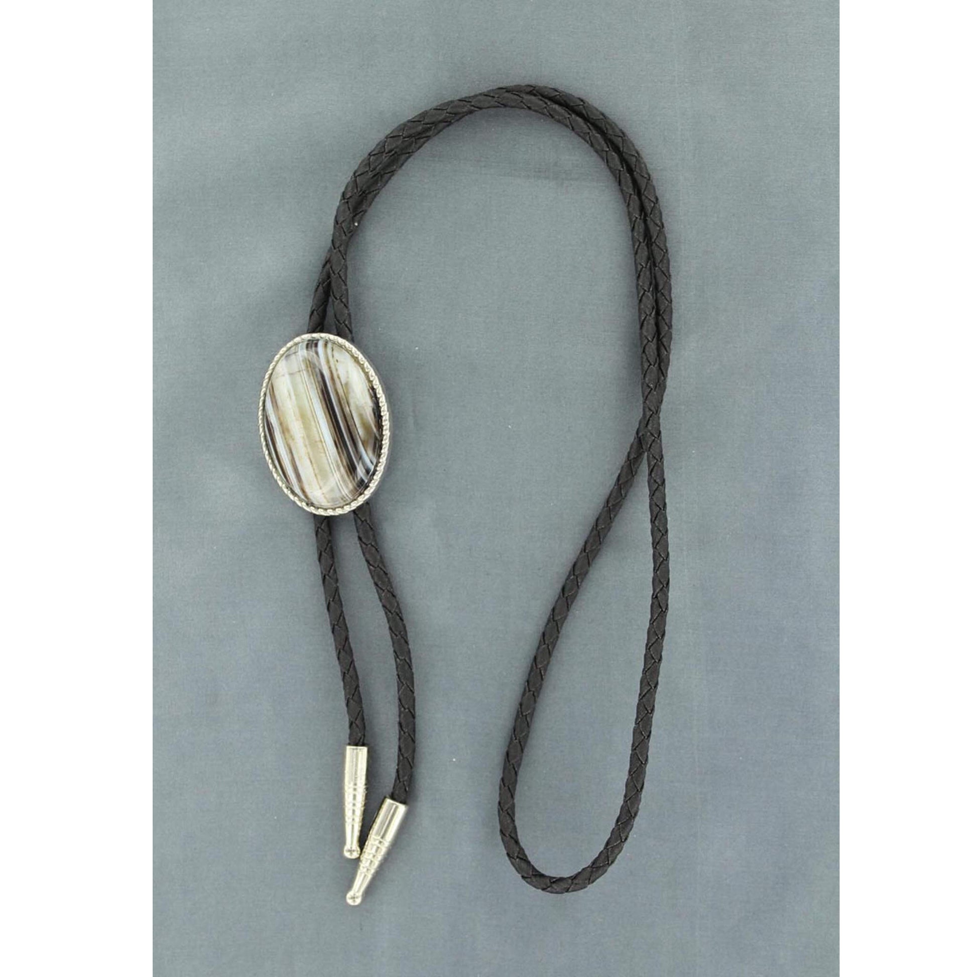 The simple bolo tie can really dress up your outfit and make a statement of true western class. Stone color and design will vary. 36" Long