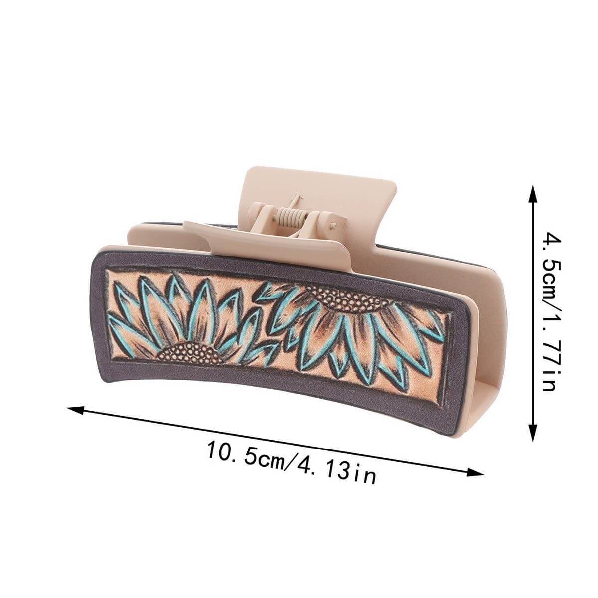 Beige hair clip with floral design and measurements on a white background