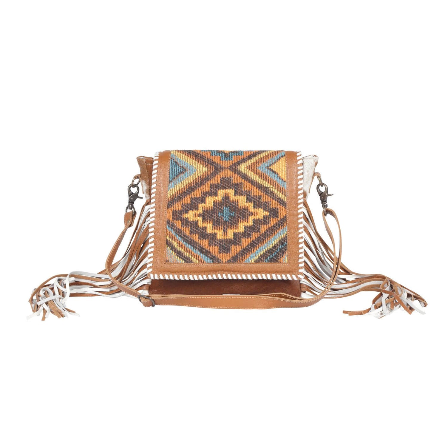 Make a statement wherever you go with the eye-catching fringe and Boho print of this bag. The leather and hair-on materials give it a natural, earthy look that complements any bohemian inspired outfit. Measures about 10"x10"x3"