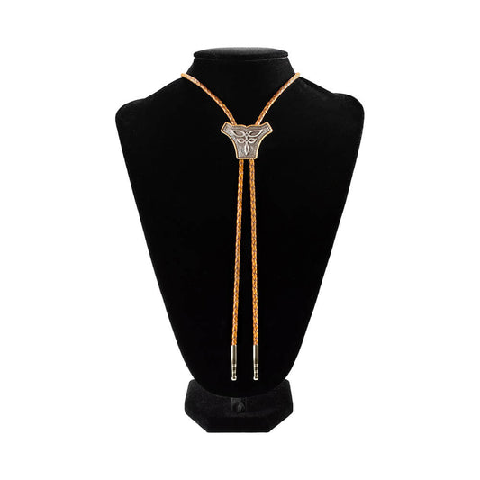 A bolo tie with a silver-toned scalloped pendant on brown cord, displayed on a black velvet mannequin bust against a white background.