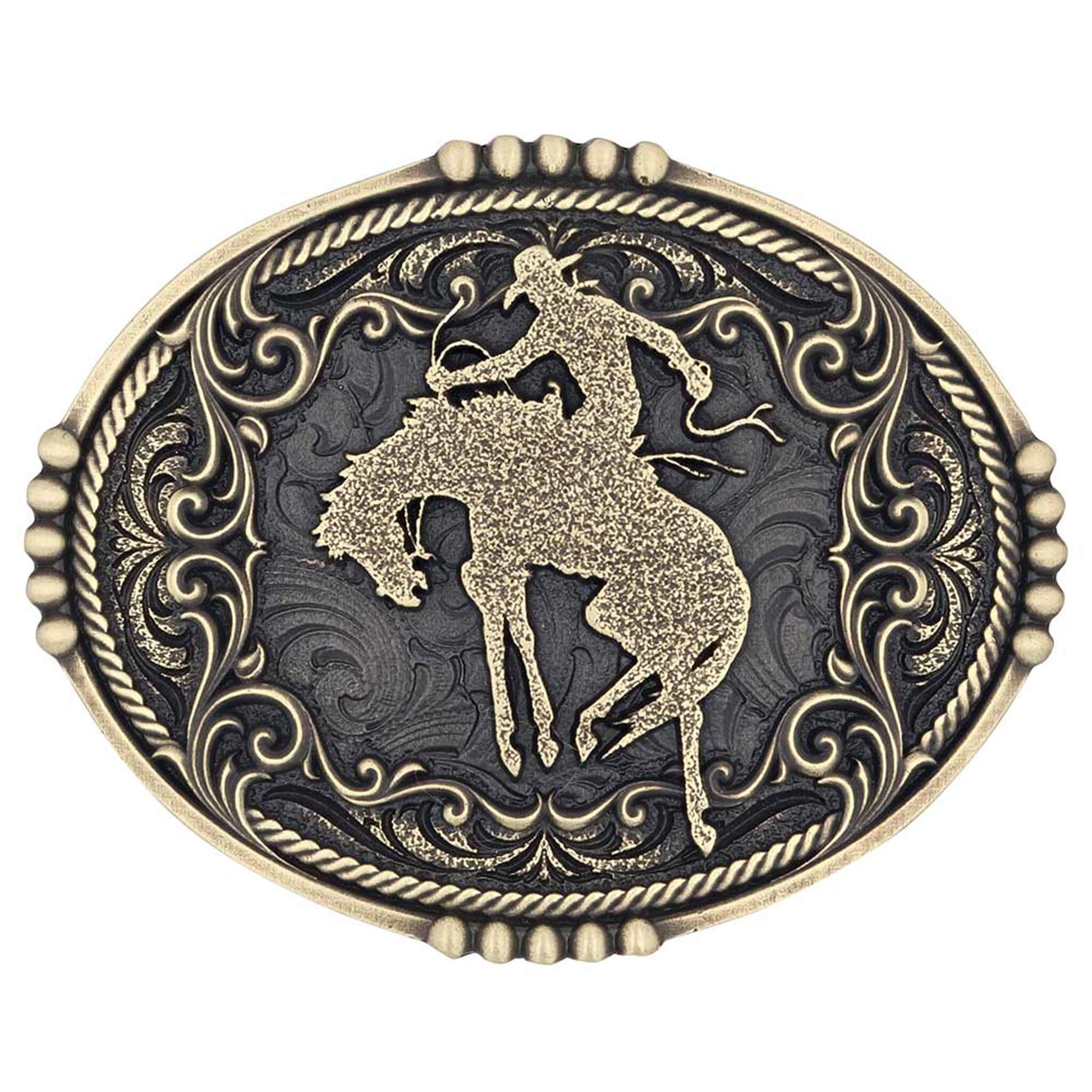 Don’t miss out on this one! The Bucking Bronc Attitude buckle features the classic silhouette of a cowboy atop a bucking bronco. Montana Silversmiths western filigree surrounds the figure along with roping and gold beading. This oval-shaped buckle is gold-toned and antiqued to highlight all the beautiful detailing. Includes a standard 1.5-inch belt swivel.&nbsp;<span data-mce-fragment="1">Brass over a white metal alloy. Measures about 4" X 3"</span>