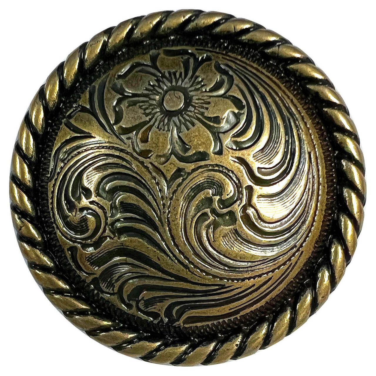 Decorative metal button with intricate floral design and gold border on a white background
