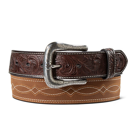 Brown leather belt with intricate silver buckle on a white background