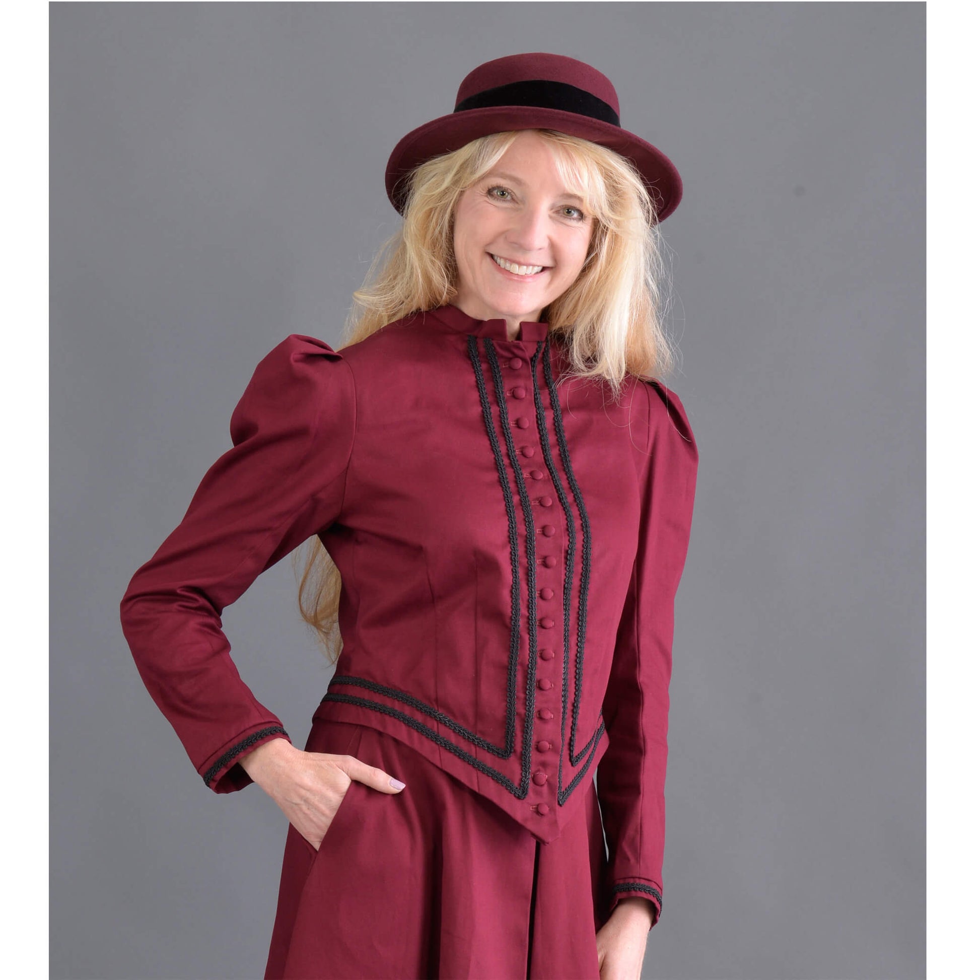 Designed for the horsewoman, this classically tailored Riding Jacket looks handsome with or without the horse. The jacket is very fitted with soutache trim and fabric covered buttons. This jacket and our riding skirt together makes a wonderful combination of tailored fit and comfort so if you ride a horse or just want to look like you do, this is the outfit. 