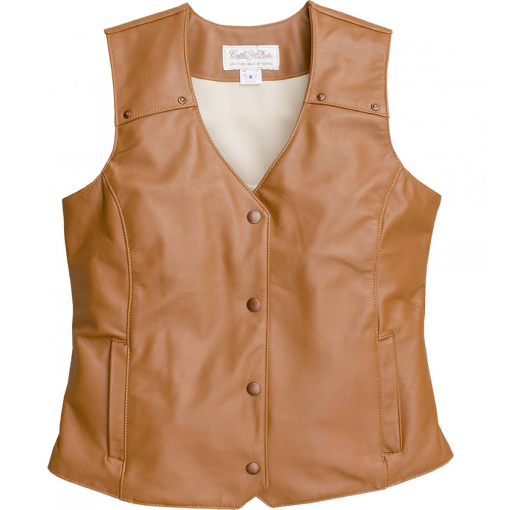 Whether you are attending your local Rodeo or saddling your horse, you’ll look fierce yet feminine in this all leather vest. This soft leather vest is styled with front and back yokes decorated with copper hammered studs. Two front pockets to keeps your necessities in and a front copper snap closure. Made of Lamb leather in a rich tobacco color and lined in polyester. Made in USA. Dry Clean.