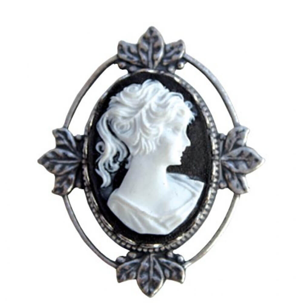 This antique reproduction cameo jewelry gives you a real heirloom look. The cameo Brooch is set in a lace edged bezel on a flower frame with safety catch pin on back. Brooch measures 1-½” long by 1-¼” wide. Matching Earrings Sold Separately. Made in USA.