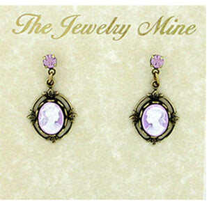 Pair of earrings with purple stones on a 'The Jewelry Mine' card.
