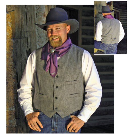 Simple, warm, stylish and possibly your next favorite vest! Finish off any western look in this V-neck button down with three welt pockets and adjustable back belt. Vest is made of wool flannel in a rich grey or camel brown. Lined. Dry Clean. Made in USA