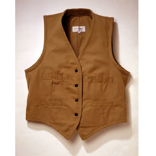 Our sturdy canvas Duck Vest is perfect for fence mending, day riding or just looking good. Made of 100% canvas duck, it comes unlined with four welt pockets. Wear this vest with one of our wildrags for the perfect trail riding outfit. Adjustable back vest buckle Dry clean only. Made in USA