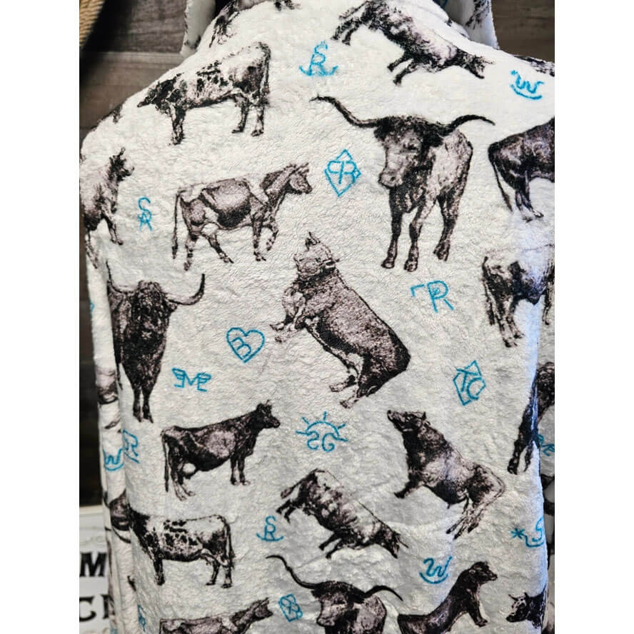 Robe with cow pattern on a white background