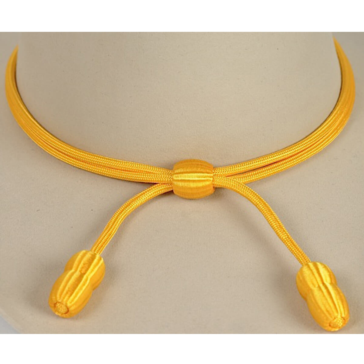 Stand out with this yellow cavalry hatband by M&amp;F Western Products. &nbsp;The slip knots easily adjusts for a snug fit. &nbsp;