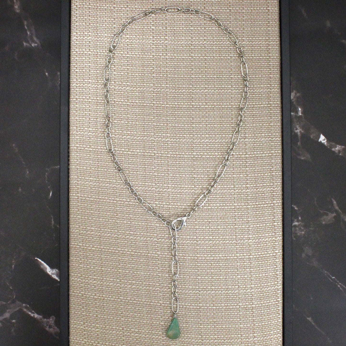 The Charming Turquoise Chain is the ultimate accessory for the woman who wants to express her unique sense of style. Connect the chain at different lengths to craft a lariat or let the pendant hang gracefully - the choice is yours.