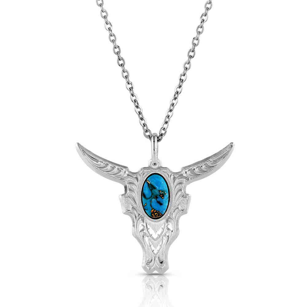 Silver bull head pendant with turquoise stone on a white background