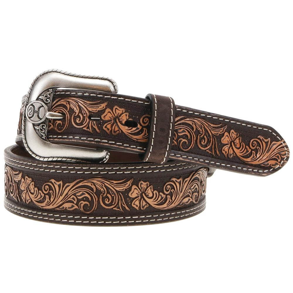 Brown leather belt with intricate patterns and a silver buckle on a white background