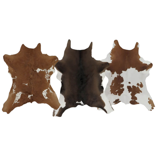 Three cowhide rugs with brown, black, and a mix of brown and white patterns on a white background.