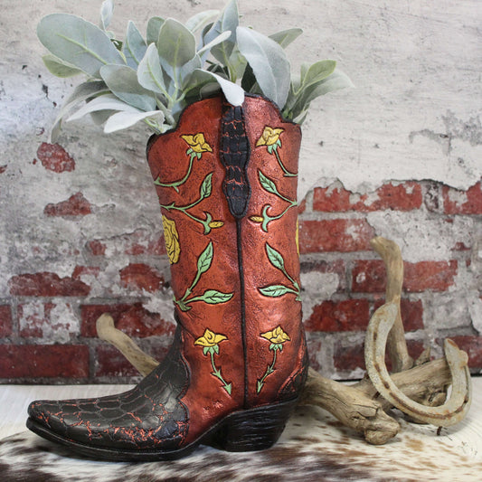 This one-of-a-kind vase brings the spirit of the Old West right into your living room. Whether you're decorating your ranch-style home or adding a touch of Western flair to your city loft, the Cowboy Boot Vase is sure to rope in compliments. Dress up your entryway, coffee table, or mantel with this eye-catching accent piece that celebrates your love of all things cowboy.