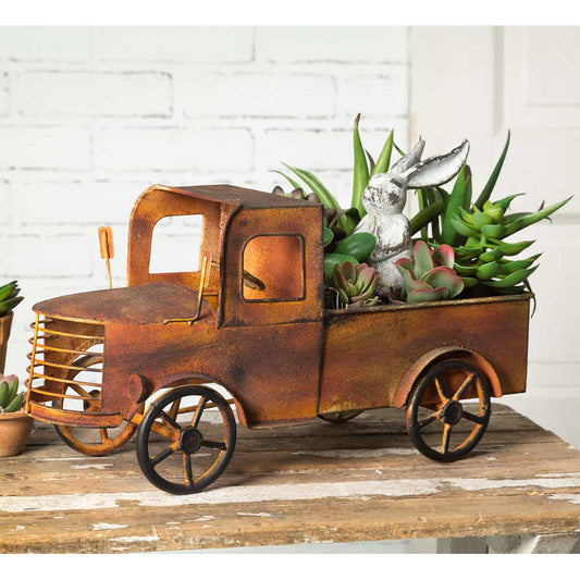 Vintage pick up truck in a cool copper, makes a great accessory for home or office with that vintage feel. The wheels do not spin on this unique metal planter. Accessories not include