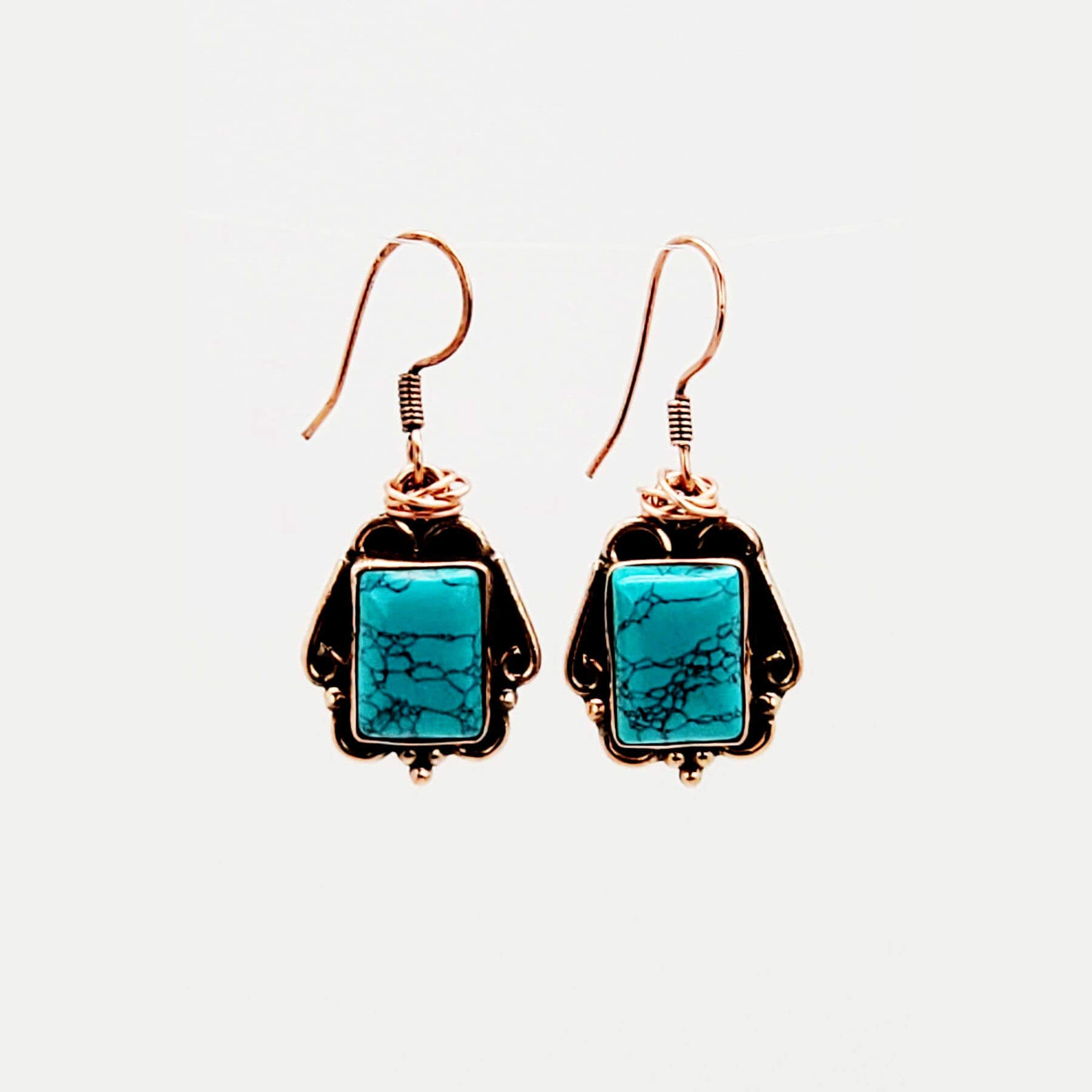 Turquoise Dreams! Copper embodies the nurturing aspect of women and their youthfulness. The earrings made with measures approx. .75″ across and 1″ from the base of hypo allergenic ear wires. Each pair has its own unique features and Made in USA.