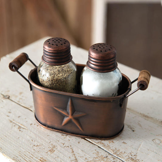 Perfectly nested in a western bucket, our shakers will be a hit at dinner. Each shaker features a mason jar design with an antique copper lid. Please wash shakers before use. Measurement: 5¾''W x 2½''D x 3¾''H