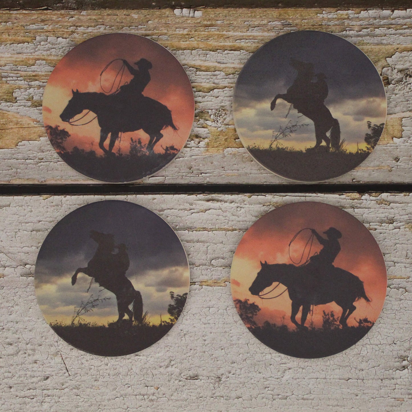 Photographer David Stoecklein's stunning images capture life in the West with emotion and simplicity. Enjoy some of his breathtaking shots while dining and entertaining with this collection of handsome absorbent ceramic coasters. Looks great with horse, western, or lodge decor. Makes a nice gift. Set of 4