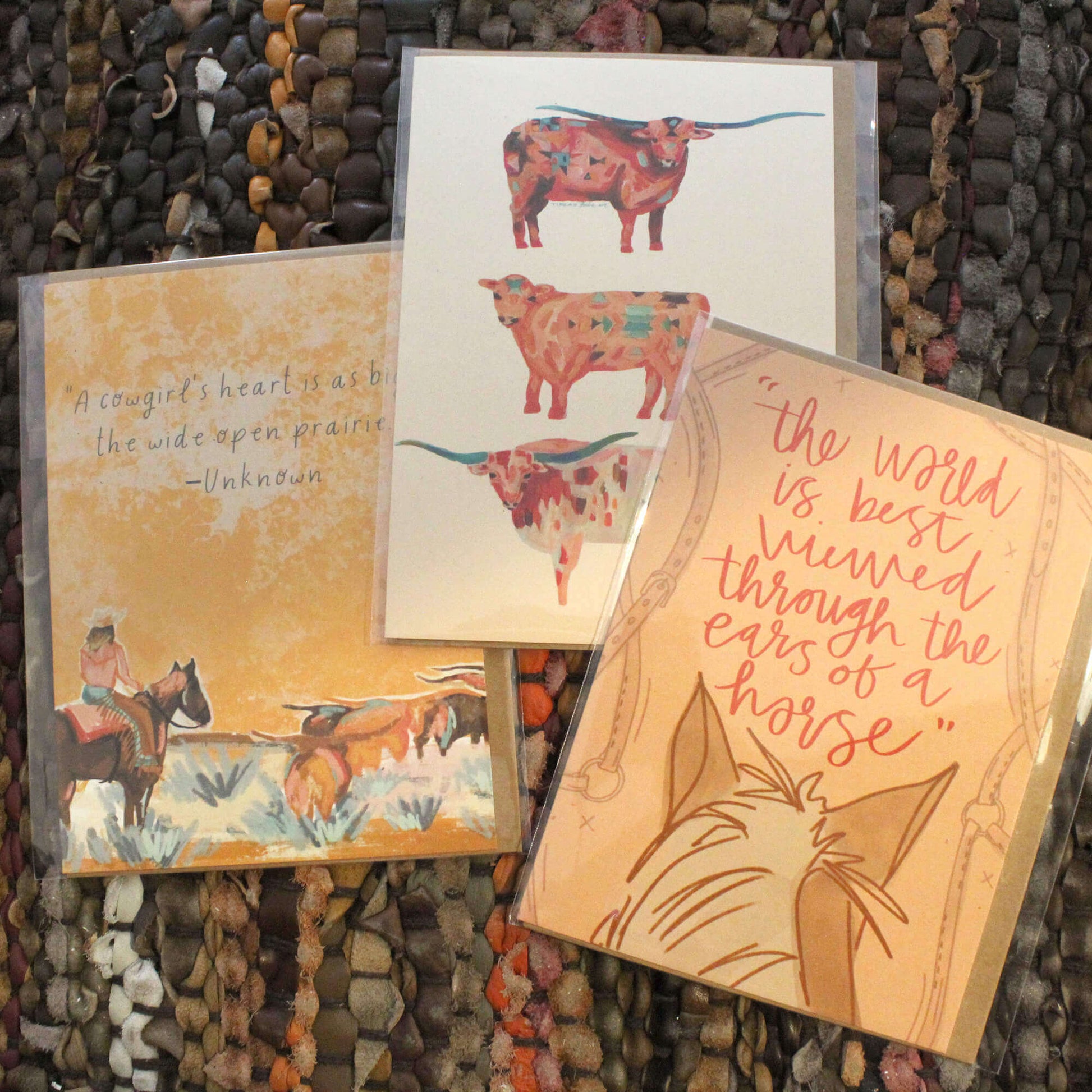 Cowgirl & Cowboy Western Greeting Cards Blank featuring colorful illustrations and quotes on a textured background.