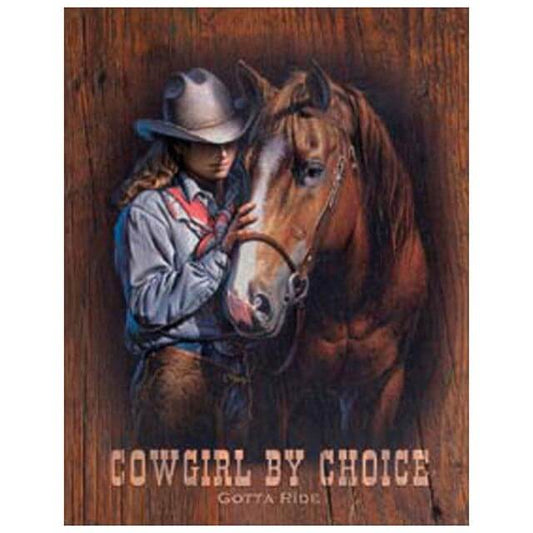 Bring the spirit of the Wild West into any space with this "Cowgirl By Choice, Gotta Ride" tin sign. It depicts the special bond between a cowgirl and her horse that embodies the rugged, independent spirit of the American West. Made in USA.