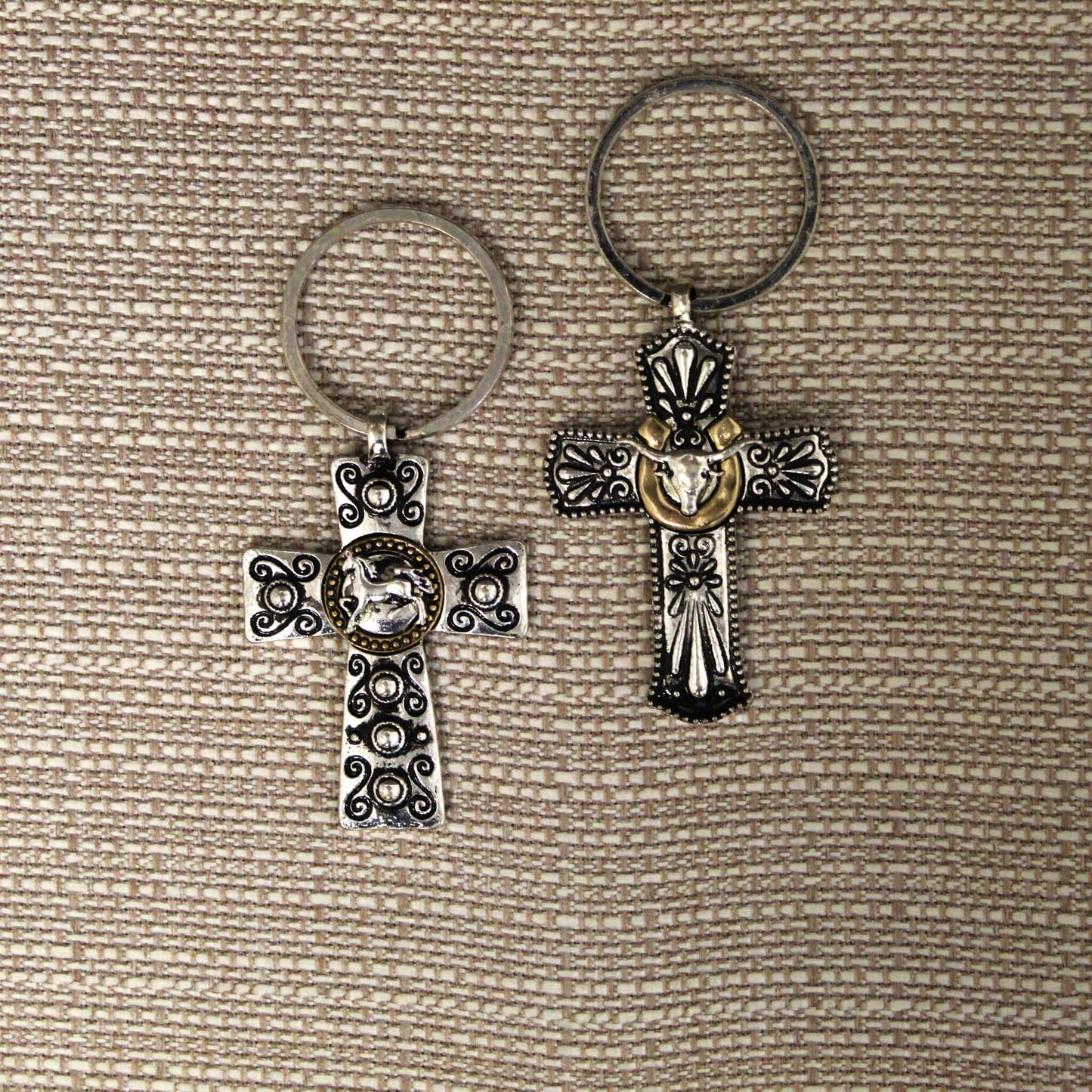 Enjoy the look and feel of the simple life with country western decorations on these exquisite cross keychains. These cross key chains are not just any ordinary keychain; it's a symbol of faith and strength. Measures about 2" by 1.5"