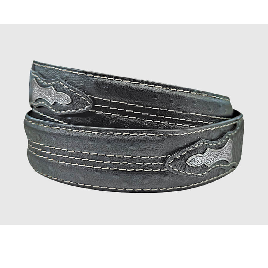 Black leather belt with decorative buckle on a light gray background
