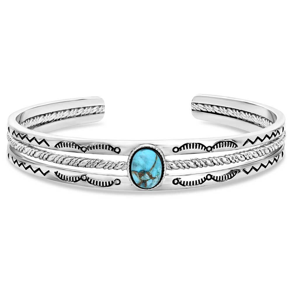 Silver bracelet with turquoise stone on a white background