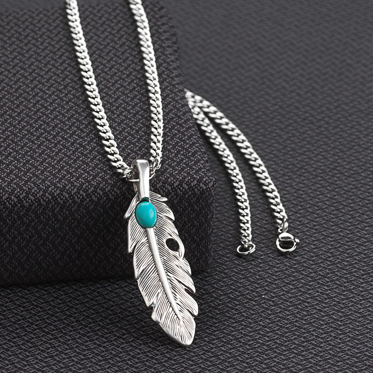 This necklace is a true statement piece that commands attention. The feather design symbolizes freedom and spirit, while the turquoise stone represents wisdom and tranquility. Pair it with a crisp button-down or rugged flannel for an effortlessly cool, Western-inspired look that's sure to turn heads.