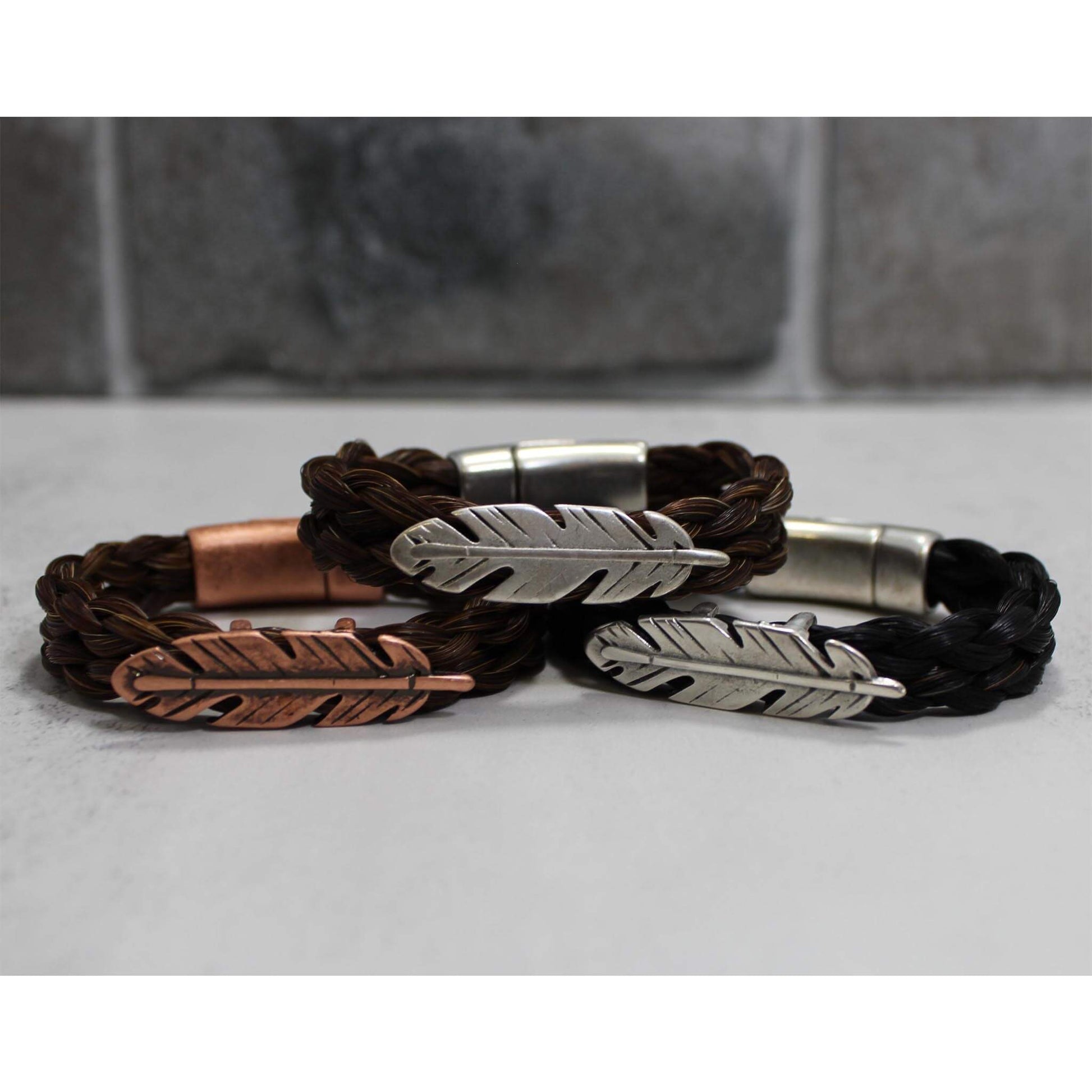 The feather is a symbol of connection with spirit in many cultures. Whether it is the power of an eagle feather or an angel's wing. It means you are being protected by the higher power you believe in. Each piece is finished with a sturdy magnetic clasp. Designed to be worn fitted vs loose, you can get the bracelet wet, but we recommend you remove it to swim or shower.