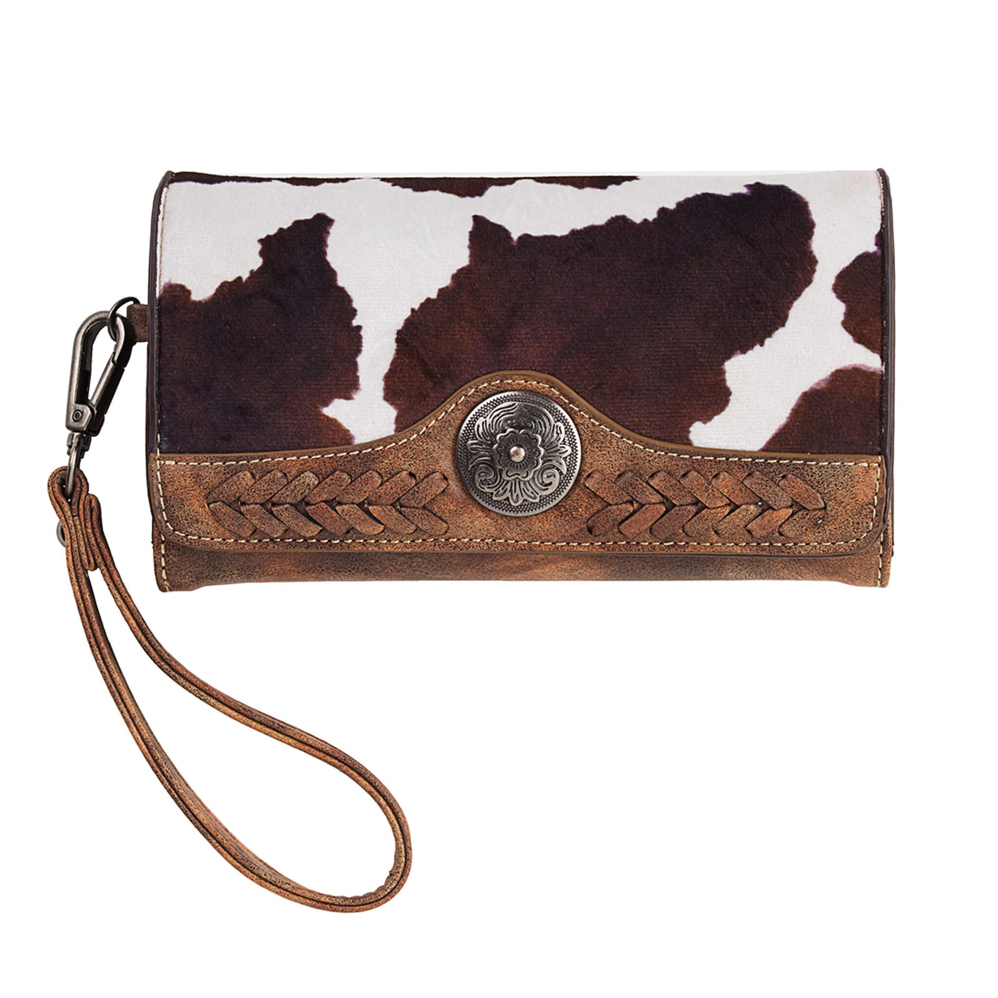 Trendy cow print fabric covers the front of the clutch. The yoke is a braided overlay with a concho accent. Comes with two zipper pockets, one on the inside, one on the outside and a removable wrist strap. Imported.