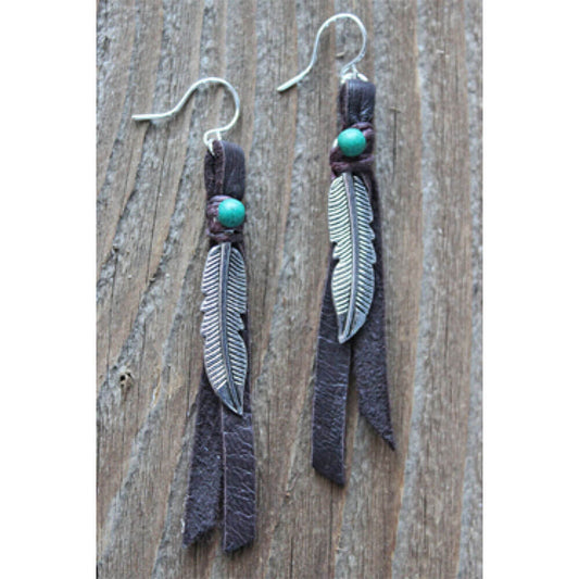 Feather &amp; leather handcrafted earrings are made by artisans of the Black Hills of South Dakota. The feather symbolizes great strength and leadership. It also brings hope &amp; good luck. Ear wires are hypo-allergenic for those with sensitive ears.