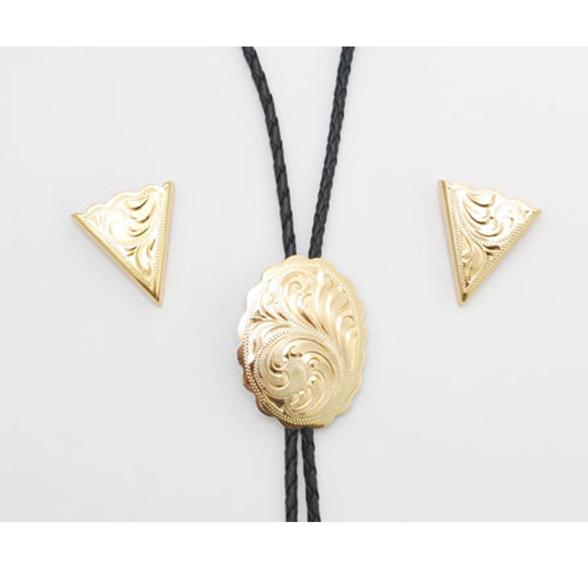 This striking gold set of collar tips and scalloped gold bolo tie make a great addition to any western outfit. Simple touch of gold for that special event. Bolo pendant measures 1.5 in x 2 in. Collar tips screw on the back to a secure fit to a collar. Imported.